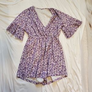Purple floral romper size large
